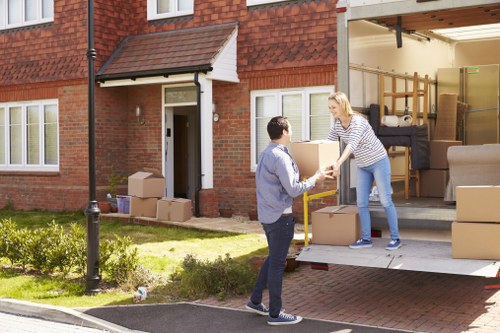 Loading furniture and boxes into a removal van