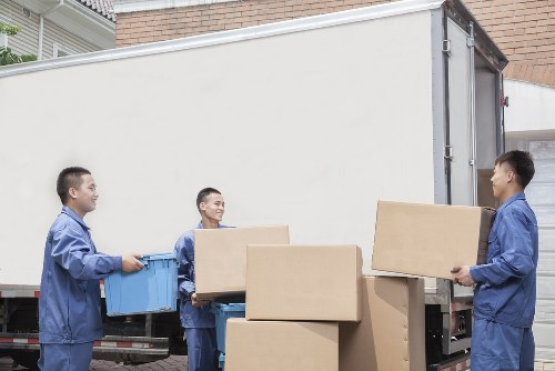 Furniture and boxes prepared for transport by a man and van service