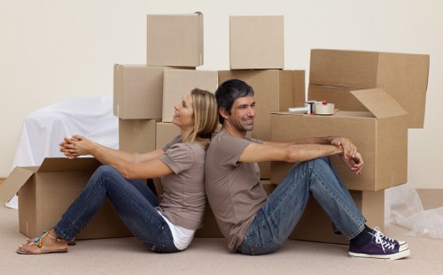 Loading furniture and boxes into a removals van
