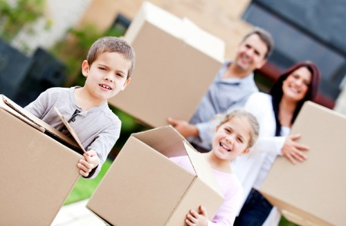 Packed boxes and household items arranged inside a moving truck