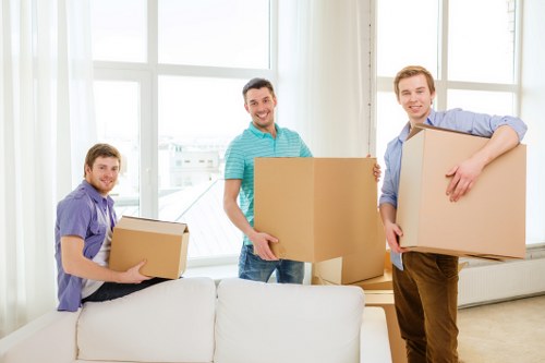 Commercial relocation preparation with labels, boxes, and office items