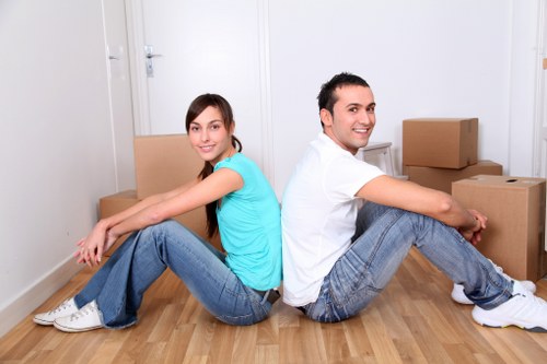 Careful loading of household items during a Downham removal