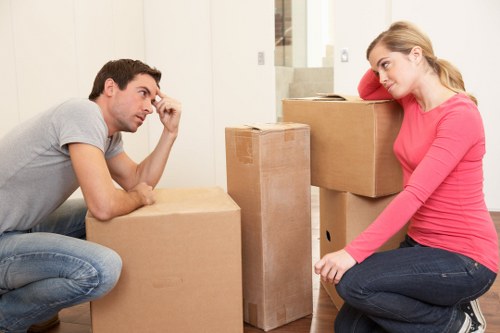 Packed moving boxes and furniture ready for transport
