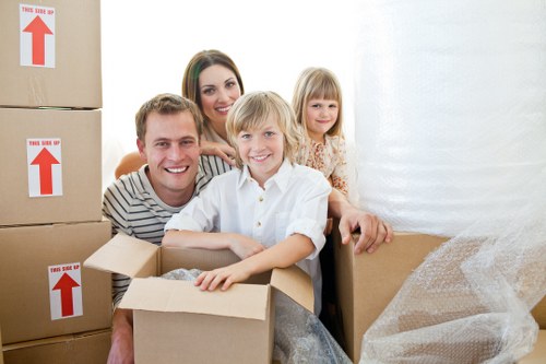 Commercial removals team handling desks and IT equipment in Downham
