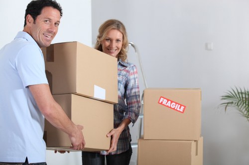 Packed boxes and furniture ready for a local house removal